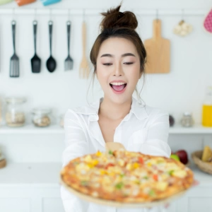 woman enjoying pizza